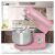 Clatronic KM 3711 pink stand mixer in kitchen setting.