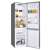Candy CCH1T518EX 253L bottom freezer refrigerator, open door view, showing interior shelves and compartments