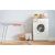 Clothes dryer with Massido sock dryer rack in a laundry room setting