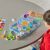 Child playing with Hand2Mind Sensory Bin Tray Set, educational activity