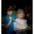 Two kids using the Outdoor Adventure Night Vision Torch red light flashlight to explore the forest at night