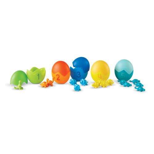 Learning Resources Counting Dino-Sorters Math Activity Set, colorful dinosaur eggs with numbers 1-10, and dinosaur figurines
