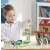 Child playing with Noah's Ark wooden playset, great for developing fine motor skills and creativity