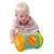 Baby playing with Baba aktivitási henger, a multi-sided activity cylinder for babies with mirror, spinning beads, and music, perfect for developing motor skills and sensory play