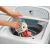 Fisher-Price Pici Praclik Hócica Plush Toy being washed in a washing machine