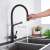 Blackswan M15 kitchen faucet with pull-out sprayer, matte black, showing the rotatable feature