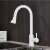 Blackswan M67 kitchen faucet, white, 2-way, pull-out sprayer, pause button, installed in a kitchen sink