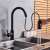 Blackswan M86 kitchen faucet with pull-down sprayer, sensor, and pause button, matte black, installed in a kitchen sink