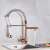 Blackswan M136 kitchen faucet, rose gold, dual spout, pull-down sprayer, LED light, in use