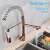 Blackswan M136 kitchen faucet, rose gold, dual spout, pull-down sprayer, LED light, in use