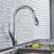 Blackswan M165 kitchen faucet with pull-down sprayer in use, chrome