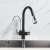 Blackswan M189 kitchen faucet with filtered water outlet and pause button, black/chrome model, 40 cm, water flowing from the spout