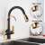 Blackswan M190 kitchen faucet with pull-out sprayer, black and gold finish, installed in a kitchen sink