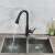 Blackswan M224 kitchen faucet, matte black, pull-out spray, single lever, 360 degree rotation, showing water flow