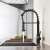Blackswan M161.1 kitchen faucet, black, water flowing from the spout