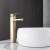 Blackswan M108 bathroom sink faucet, long gold model, 30.5 cm, installed in a bathroom