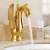 Blackswan M134 Golden Swan 19 cm gold bathroom sink faucet with water running