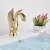 Blackswan M134 Golden Swan 19 cm gold bathroom sink faucet installed on a white sink