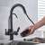 Blackswan M254 kitchen faucet with sensor and purified water outlet, matte black, in use