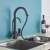 Blackswan M262 kitchen faucet with pull-down sprayer and filtered water spout, matte black, installed in a kitchen sink