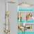 Blackswan M136 shower column, white and gold model, with adjustable shower head, handheld shower, and digital display, showing the shower head, handheld shower, and bidet