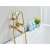 Blackswan M41 gold bathtub faucet with shower head in use, showing the faucet in a bathroom setting