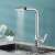 Blackswan M368 kitchen faucet with pull-out spray, chrome finish, water flowing from the spout, installed in a kitchen sink