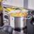 Rösle Basic stainless steel pot with lid, cooking vegetables