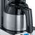 Close-up of the Graef FK512 coffee maker's stainless steel thermal carafe with black handle