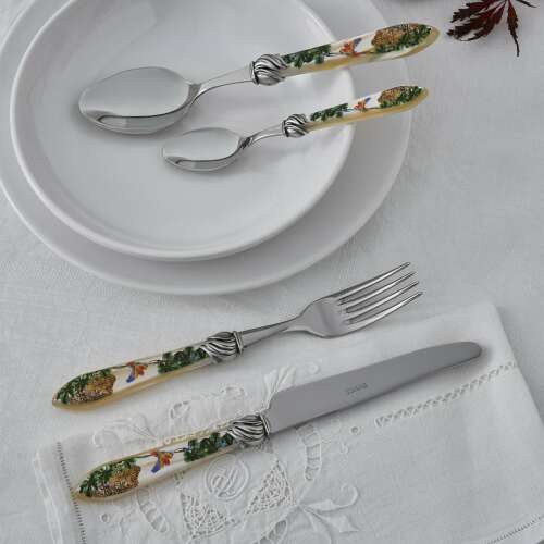 Casa Bugatti Falabella Old-silver cutlery set with jungle design, 6 person, on a white table