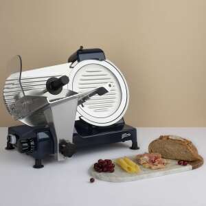 H.Koenig MSX256 electric meat slicer, blue and silver, with a bread loaf, prosciutto, and cheese on a marble cutting board - Slicing Machine