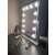 LED makeup mirror with 12 bulbs, white, 30x40cm, on a table with makeup products