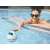 Woman in a pool using the Bestway MusicWave floating LED Bluetooth speaker