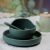 Petite & Mars Misty Green silicone baby dinnerware set in use