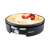 Steba XXL CR 36 electric crepe maker with a crepe on it, topped with strawberries and raspberry sauce