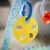 Close-up of yellow Baby Einstein play mat toy