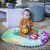 Baby playing on Baby Einstein water play mat