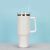 White 1200ml tumbler with handle and straw on plain background
