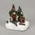 Illuminated Christmas chapel with choir figurine, festive decoration
