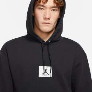 Jordan Essentials Statement Fleece Pullover Hoodie in black, featuring a Jumpman logo on the chest - Men's Sweater