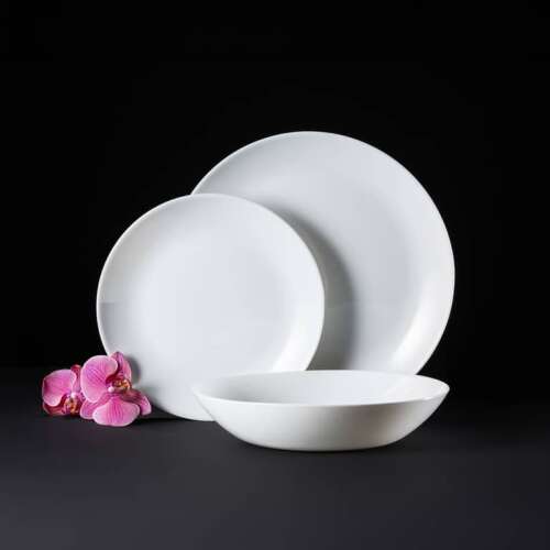 Ambition Basic 18 piece white dinnerware set, featuring a dinner plate, dessert plate, and soup bowl