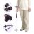 Black adjustable walking stick with LED and quad base in use