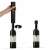 Adler electric wine opener in use, opening a bottle of wine