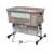 Pepita co-sleeper crib with adjustable height, wheels, and storage basket, front view, cappuccino color