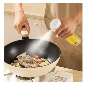 Oliviera oil sprayer in use, spraying oil on food in a pan - Oil & Vinegar Dispenser