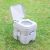 Trizand Portable Toilet with open seat on grass