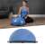 Woman resting on Springos Bosu balance ball, product detail