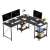 Timeless Tools L-shaped desk with shelves, black, in use with two monitors, lamp, and plants