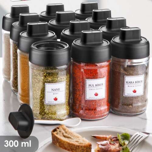 Loki 12-piece spice jar set with black lids, filled with various spices.