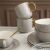Royal Ambition szürke porcelán bögrék és tálak arany szegéllyel